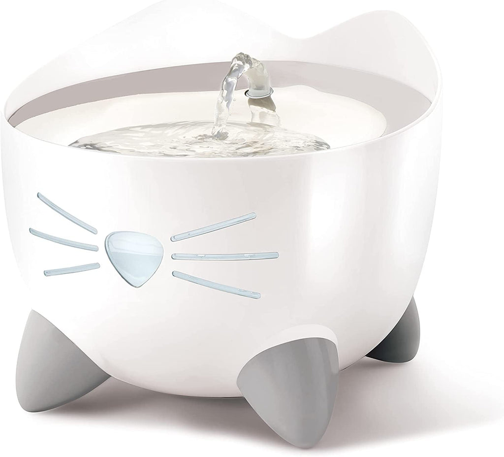 White pet water fountain shaped like a cat on a white background