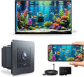 A wall-mounted aquarium camera shown with a colorful fish tank, a smartphone displaying the live feed, a power adapter, and a 32GB storage card on a white background.