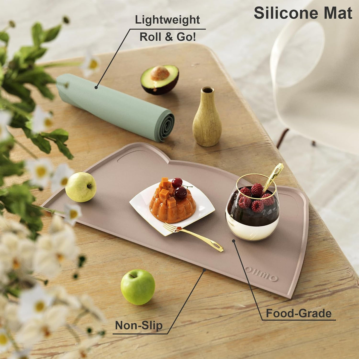 Silicone mat on a table with food items and text highlighting features