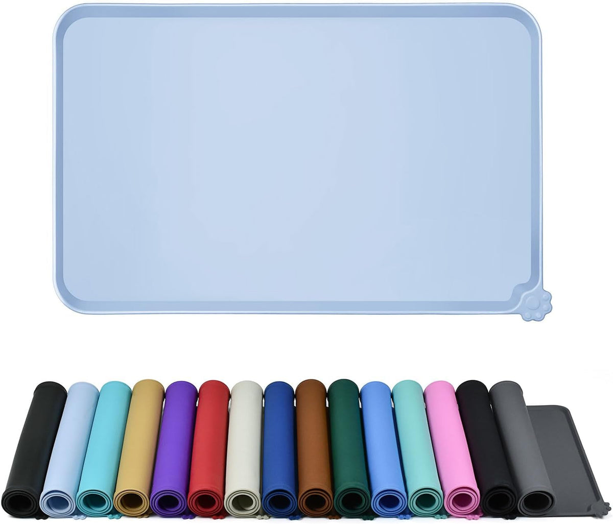 Light blue raised-edge silicone feeding mat above rolled mats in multiple colors.
