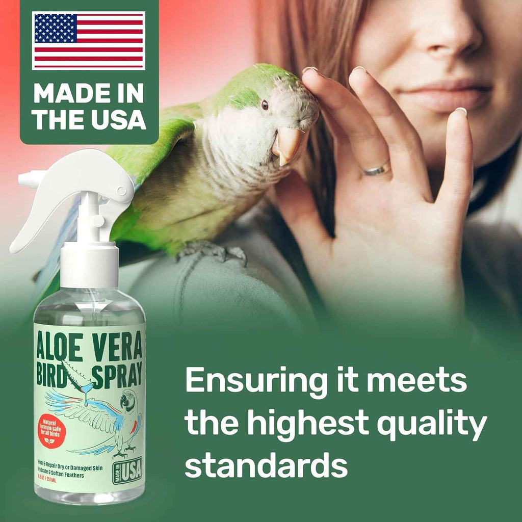 Aloe vera bird spray bottle with a parrot and a person's hand, set against a blurred background.
