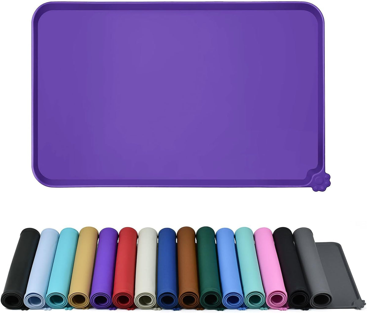 Purple raised-edge silicone feeding mat above rolled mats in multiple colors.
