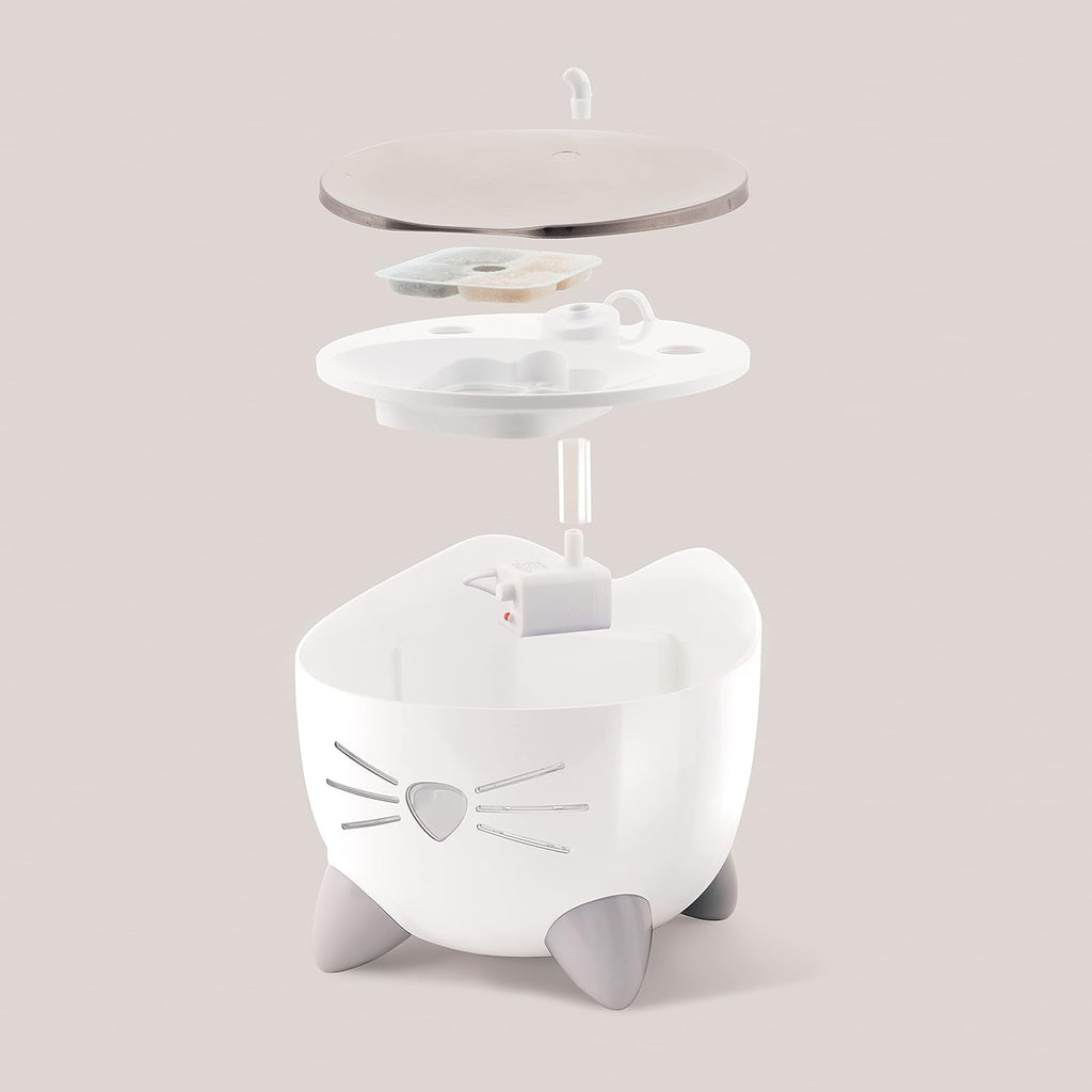 White pet water fountain with cat design on a light gray background