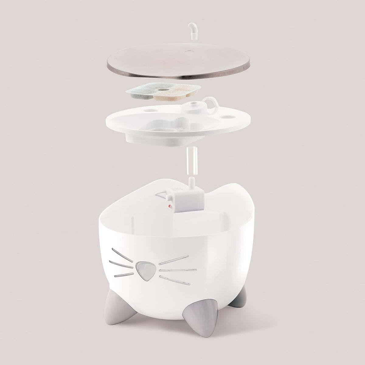 White pet water fountain with cat design on a light gray background