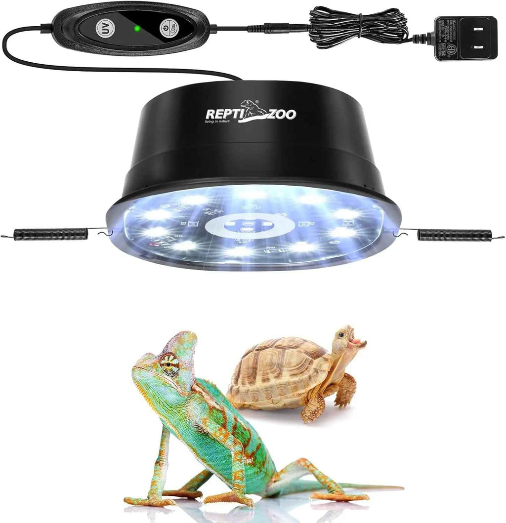 Reptile Zoo LED reptile heat lamp kit shown on a white background, including the black dome lamp with bright internal LEDs, a remote control, power adapter, and two reptiles below: a green chameleon and a brown tortoise. The product brand 'REPTILE ZOO' is visible on the lamp.