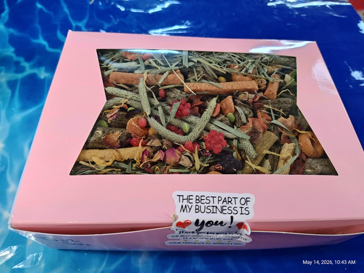 Pink box with window displaying dried herbs and flowers, labeled 'The best part of my business is you!'.