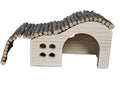 A small wooden hamster house with a curved roof made of small logs, featuring an arched entryway and four round ventilation holes on the side, shown on a plain white background.