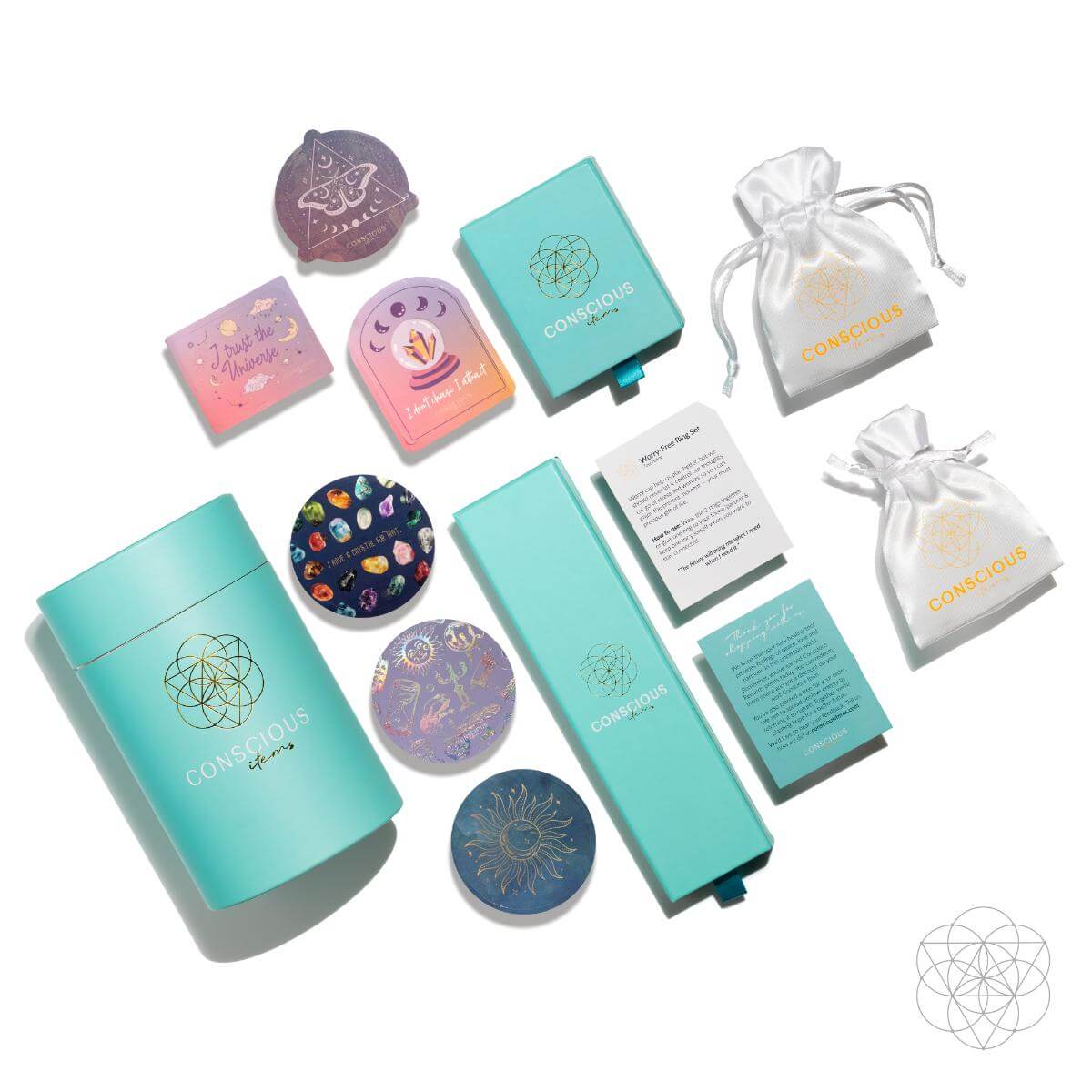Conscious Items packaging display with turquoise boxes, white drawstring pouches, printed cards, and stickers.