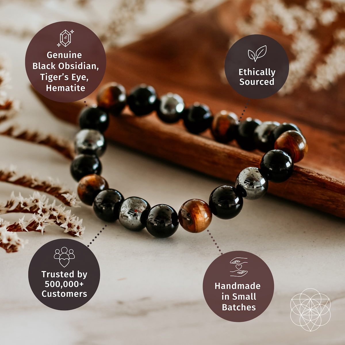Genuine black obsidian, tiger's eye, hematite bracelet on a wooden surface with ethical and quality claims.