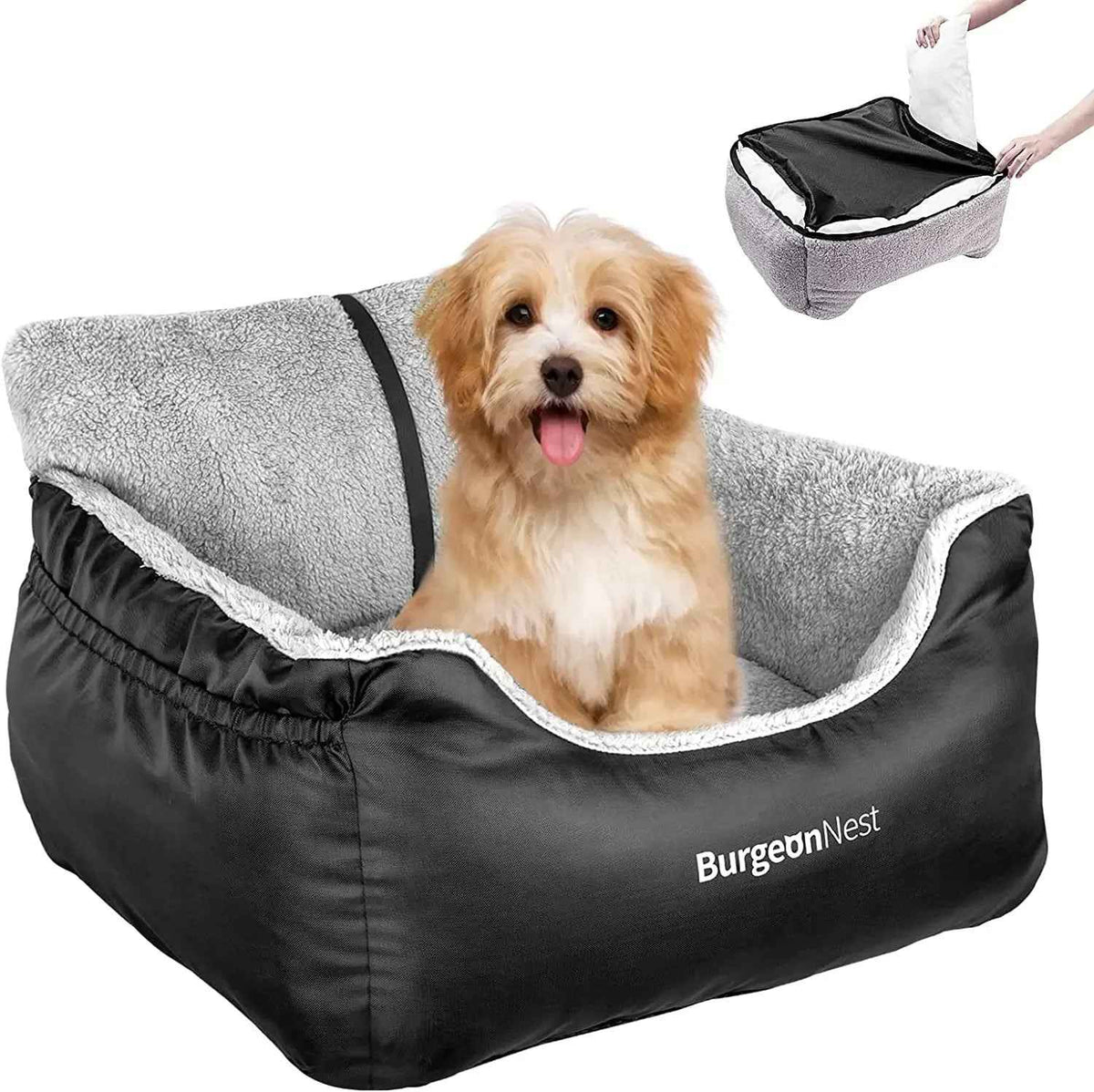 A small tan and white dog sits in a black and gray BurgeonNest pet bed with a gray sherpa lining. A small inset in the top right shows a person's hands stretching the bed to demonstrate its flexibility.