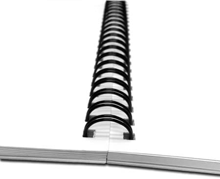 Close-up of black twin-loop wire binding and white book pages