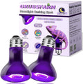 Two purple heat bulbs with GrubsFarm packaging in the background.